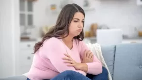 A Girl Sitting In A Depression