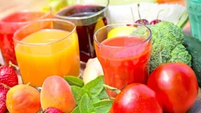 A Group Of Glasses With Different Juices