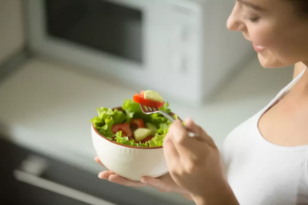 Woman Eating Healthy Salad
