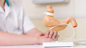 Doctor With Gastric Band Model