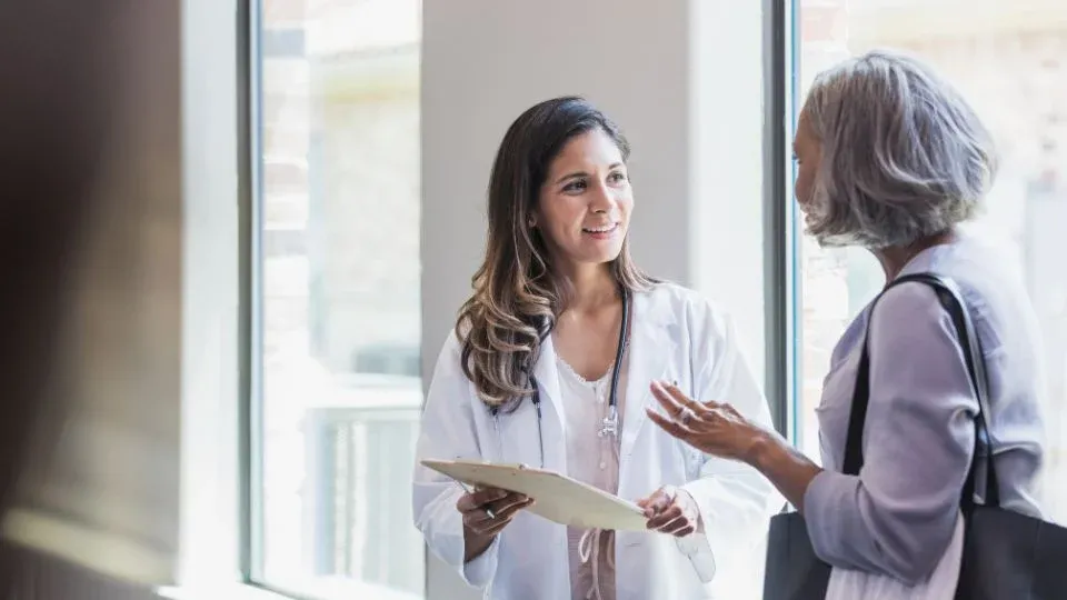 Doctor Consulting With A Patient